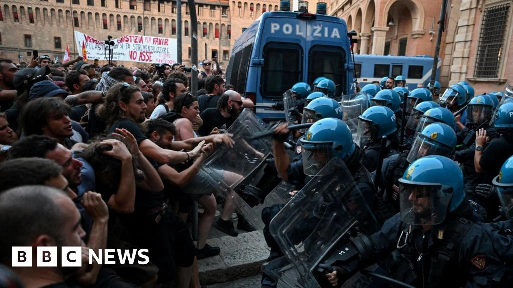 Dozens hurt in Bologna protests after man dies while being restrained by police