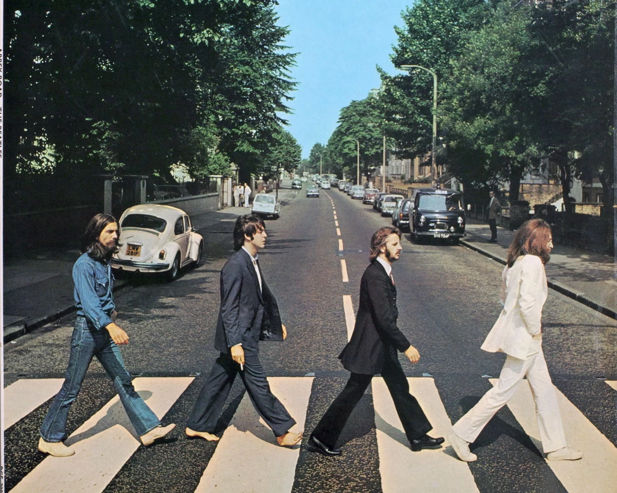 Four blokes and a zebra crossing: the banality and beauty of the Beatles’ Abbey Road cover