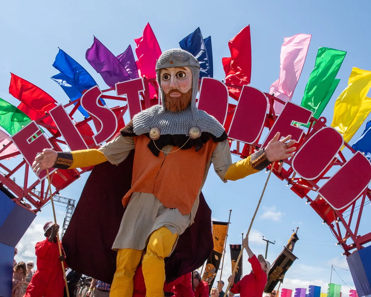 ‘It’s Glastonbury on wheels’: bards and musicians flock to eisteddfod to celebrate Welsh culture